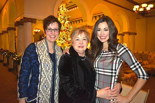 Chanley Painter standing with her mother and sister 